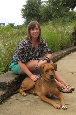 Photo of attorney Megan W. L. Malec with her dog